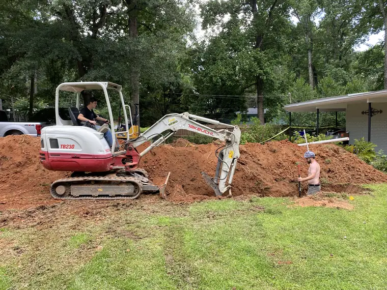 SepticRooter™ excavator installing a septic system in Banks County, GA