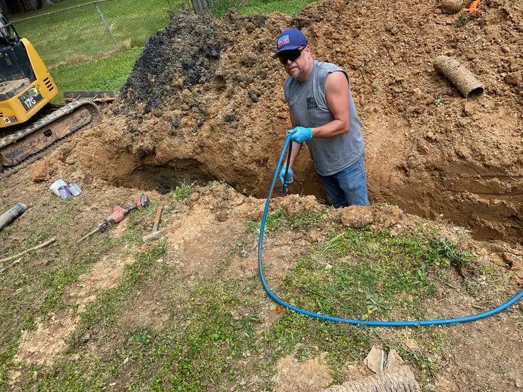 SepticRooter™ excavating to locate a septic tank in Chamblee, GA
