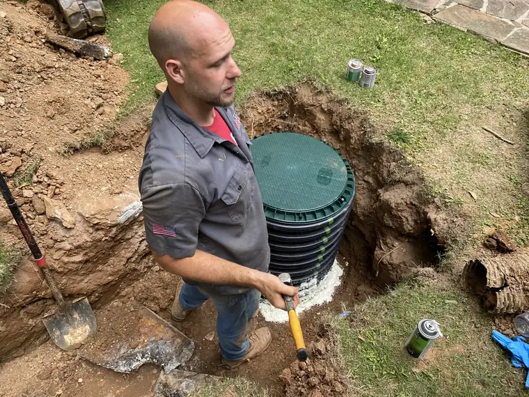 SepticRooter™ technician diagnosing a septic system in Chamblee, GA