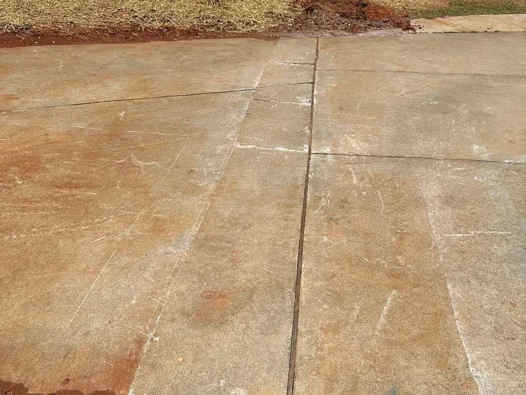 Aerial view of completed drain field replacement area seeded with straw cover in McDonough backyard