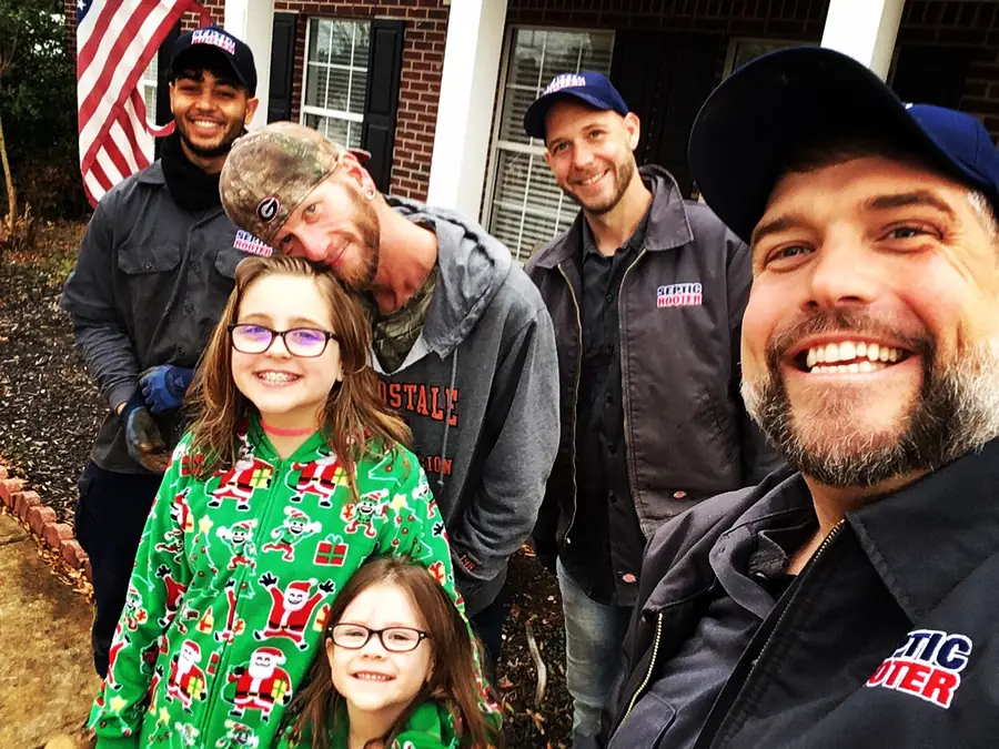 The SepticRooter family and crew